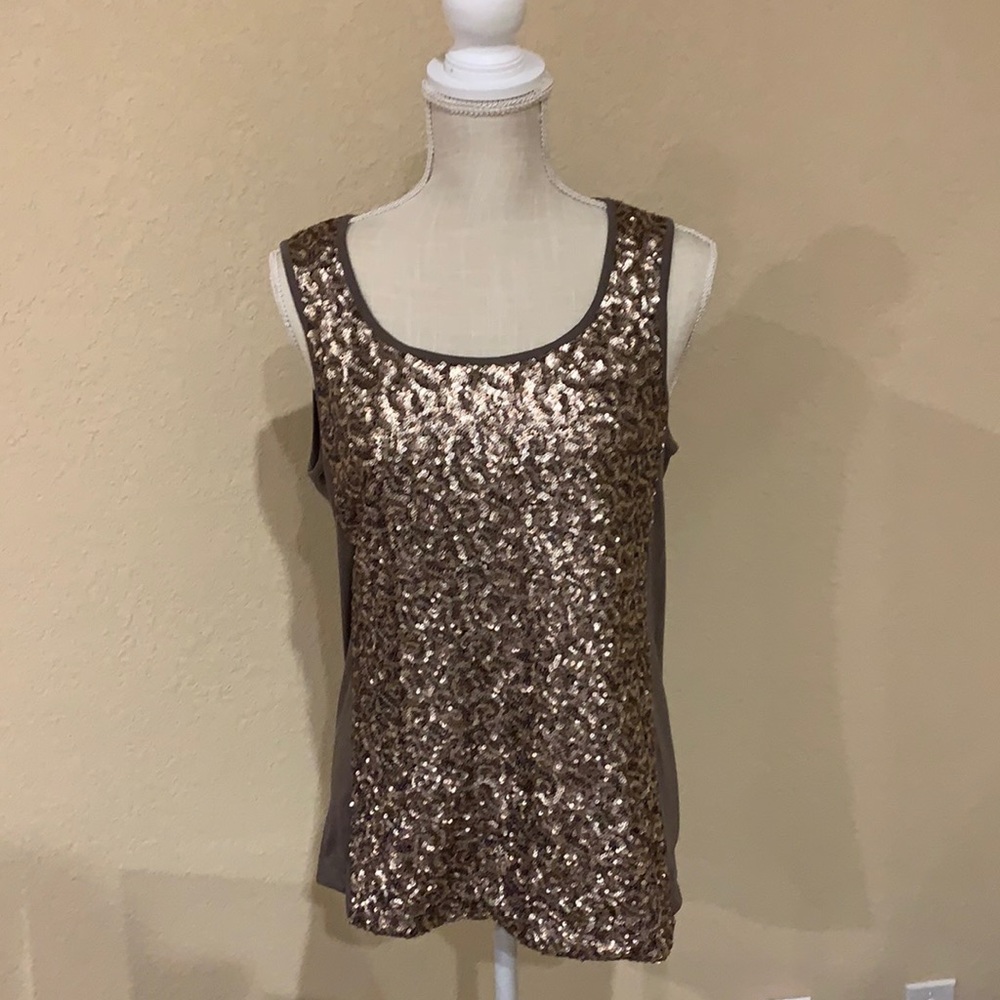 Classy accent top, great with denim, skirts or slacks